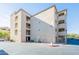 Three-story apartment building with balconies and parking lot at 920 E Devonshire Ave # 2019, Phoenix, AZ 85014