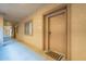 Residential hallway with unit door and carpet at 920 E Devonshire Ave # 2019, Phoenix, AZ 85014