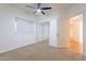 Spacious bedroom with mirrored closet and ceiling fan at 920 E Devonshire Ave # 2019, Phoenix, AZ 85014