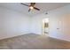 Bright bedroom with carpet flooring and access to bathroom at 920 E Devonshire Ave # 2019, Phoenix, AZ 85014