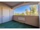 Covered patio with artificial turf and view at 920 E Devonshire Ave # 2019, Phoenix, AZ 85014