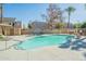 Inviting community swimming pool with lounge chairs at 920 E Devonshire Ave # 2019, Phoenix, AZ 85014