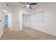 Bedroom with mirrored closet doors and neutral decor at 920 E Devonshire Ave # 2019, Phoenix, AZ 85014