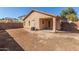 Private backyard with covered patio and AC unit at 16019 W Moreland St, Goodyear, AZ 85338