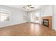 Living room with tile floors and fireplace at 16019 W Moreland St, Goodyear, AZ 85338