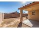 Large backyard with covered patio and block wall at 16019 W Moreland St, Goodyear, AZ 85338