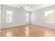 Spacious bedroom with light flooring and ceiling fan at 16019 W Moreland St, Goodyear, AZ 85338
