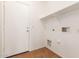 Convenient laundry room with hookups and shelving at 16019 W Moreland St, Goodyear, AZ 85338