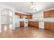Kitchen with wood cabinets and tile flooring at 16019 W Moreland St, Goodyear, AZ 85338
