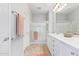 Double vanity bathroom with a walk-in shower at 26984 W Yukon Dr, Buckeye, AZ 85396