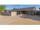 Single-story home with carport and modern brick facade at 3033 E Sierra St, Phoenix, AZ 85028