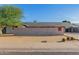 Single story home with modern brick facade at 3033 E Sierra St, Phoenix, AZ 85028