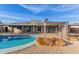 Inviting kidney-shaped pool with a spacious patio at 3033 E Sierra St, Phoenix, AZ 85028