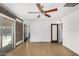 Spacious bedroom with ceiling fan and sliding glass doors leading to patio at 3033 E Sierra St, Phoenix, AZ 85028