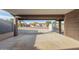 Covered carport with view of neighboring homes at 3033 E Sierra St, Phoenix, AZ 85028