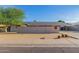 Single story home with modern brick facade at 3033 E Sierra St, Phoenix, AZ 85028