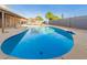 Relaxing kidney-shaped pool perfect for summer fun at 3033 E Sierra St, Phoenix, AZ 85028