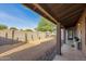 Landscaped backyard with a covered patio at 3033 E Sierra St, Phoenix, AZ 85028