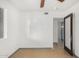 Bright bedroom with ceiling fan and neutral walls at 3033 E Sierra St, Phoenix, AZ 85028