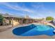 Inviting kidney-shaped pool with a spacious patio at 3033 E Sierra St, Phoenix, AZ 85028