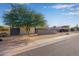 Mid-century modern home with a low-profile design and landscaping at 3033 E Sierra St, Phoenix, AZ 85028