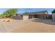 Single-story home with carport and modern brick facade at 3033 E Sierra St, Phoenix, AZ 85028