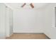 Bright bedroom with window, ceiling fan and built-in closet at 3033 E Sierra St, Phoenix, AZ 85028