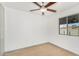 Bright bedroom with window, ceiling fan and built-in closet at 3033 E Sierra St, Phoenix, AZ 85028