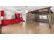 Modern kitchen with red cabinets, stainless steel appliances, and granite countertops at 3033 E Sierra St, Phoenix, AZ 85028