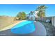 Relaxing kidney shaped pool in the backyard at 8319 W Mclellan Rd, Glendale, AZ 85305