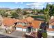 Aerial view of a house and neighborhood with mountains in the background at 19537 N 69Th Ave, Glendale, AZ 85308
