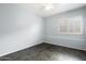 Simple bedroom with tile flooring and window shutters at 19537 N 69Th Ave, Glendale, AZ 85308