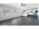 Bright Gathering room with tile flooring and built-in cabinetry at 19537 N 69Th Ave, Glendale, AZ 85308