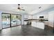 Kitchen with island, stainless steel appliances, and pool view at 19537 N 69Th Ave, Glendale, AZ 85308