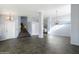 Spacious living room with tile floors and a staircase at 19537 N 69Th Ave, Glendale, AZ 85308