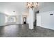 Open living area with tile floors and views to entryway at 19537 N 69Th Ave, Glendale, AZ 85308