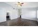 Main bedroom with wood-look flooring and ceiling fan at 19537 N 69Th Ave, Glendale, AZ 85308