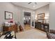 Home office with French doors opening to living area at 31153 N 117Th Dr, Peoria, AZ 85383