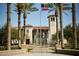 Elegant community clubhouse with fountain and palm trees at 4405 N 203Rd Ave, Buckeye, AZ 85396