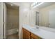 Clean bathroom with single sink vanity and bathtub at 5138 W Fulton St, Phoenix, AZ 85043