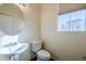 Simple bathroom with white sink and toilet at 5138 W Fulton St, Phoenix, AZ 85043