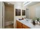 Clean bathroom with single sink vanity and bathtub at 5138 W Fulton St, Phoenix, AZ 85043