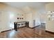 Bright entryway with wood floors and a view to the staircase at 5138 W Fulton St, Phoenix, AZ 85043