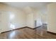 Spacious entry with wood floors and access to the staircase at 5138 W Fulton St, Phoenix, AZ 85043