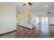 Living room with hardwood floors, and a staircase at 5138 W Fulton St, Phoenix, AZ 85043