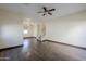Bright living room with hardwood floors and staircase at 5138 W Fulton St, Phoenix, AZ 85043