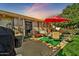 Covered patio with seating area, adjacent to the house at 18903 N 97Th Ln, Peoria, AZ 85382