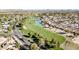 Aerial view of residential area adjacent to a golf course at 18903 N 97Th Ln, Peoria, AZ 85382