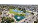 Aerial view of neighborhood green space with pond and fountain features at 18903 N 97Th Ln, Peoria, AZ 85382