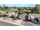 Aerial home view showing solar panels, landscaping, and neighborhood at 18903 N 97Th Ln, Peoria, AZ 85382
